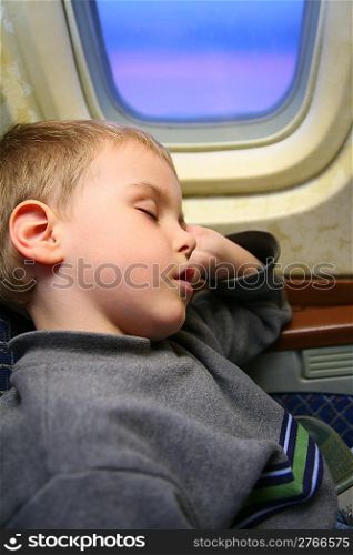boy airplane sleep