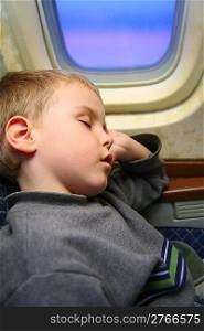boy airplane sleep