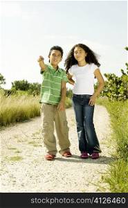 Boy and a girl standing in a walkway