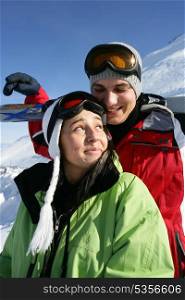 Boy and girl at ski resort