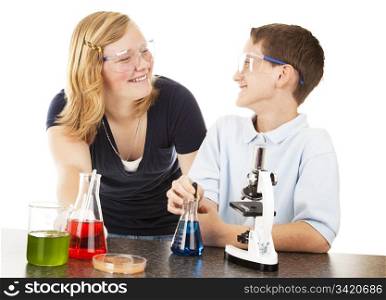 Boy and girl having a great time in science class. White background.