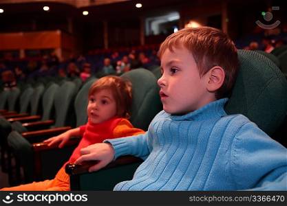 Boy and girl in theater