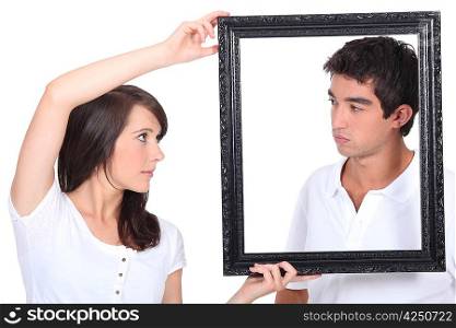 Boy and girl with black frame