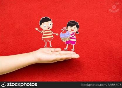 boy and girl with cupcake on a hand