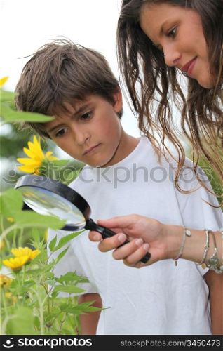 boy and mother observing nature