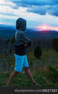 Boy at the evening in Altai mountains. Boy at the evening in Altai