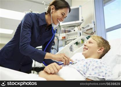 Boy Being Examined By Female Consultant In Emergency Room