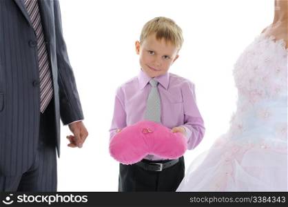 boy brings the newlyweds wedding rings. Isolated on white background