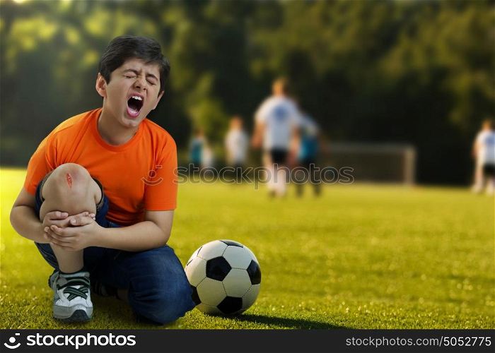 Boy crying out in pain