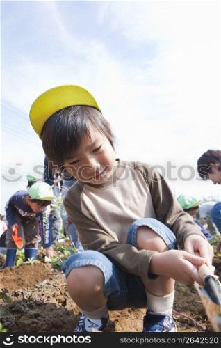 Boy digging
