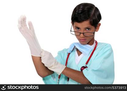 Boy dressed as surgeon