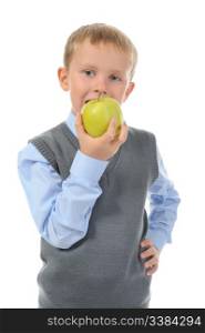 Boy eats an apple. Isolated on white background