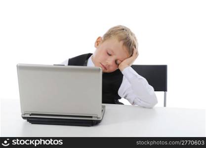 boy fell asleep at the computer. Isolated on white background