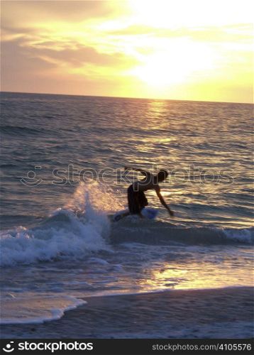 boy going surfing