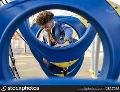 boy having fun playground outside