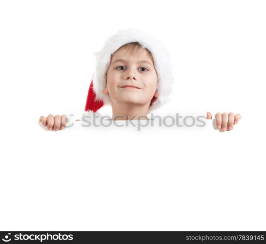 Boy holding a christmas poster isolated on white background