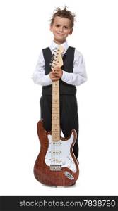 Boy holding a guitar isolated on a white background