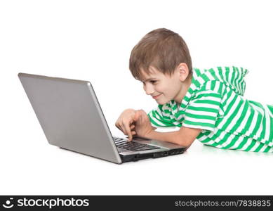 Boy holding a laptop isolated on white background