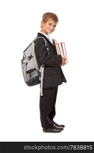 Boy holding books isolated on a white background. Back to school