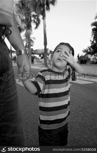 Boy holding his father&acute;s hand, Malecon, Santo Domingo, Dominican Republic