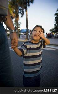Boy holding his father&acute;s hand, Malecon, Santo Domingo, Dominican Republic