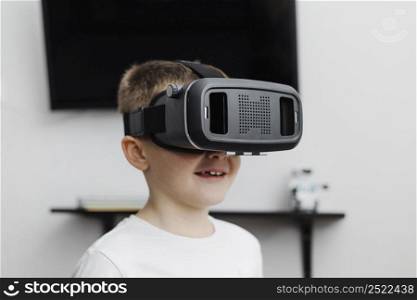 boy home using virtual reality headset