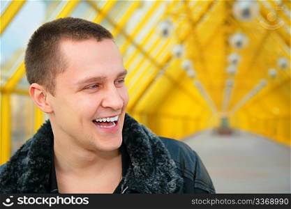 boy in black jacket on footbridge