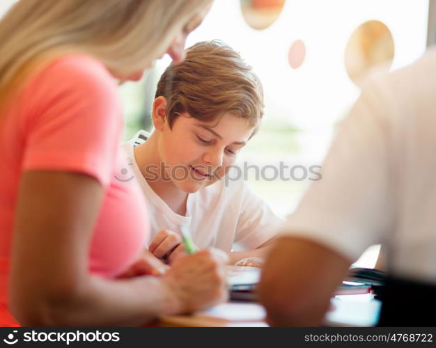 Boy in library with books. Boy in library