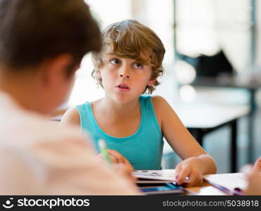 Boy in library with books. Boy in library