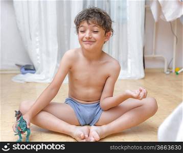 Boy Indoors Meditating