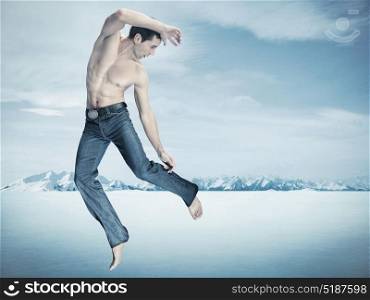 Boy jumping in the snow