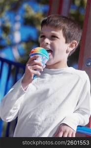 Boy licking an ice-cream