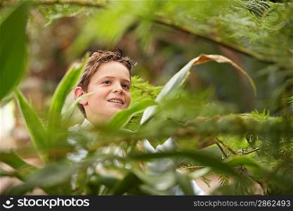 Boy Looking at Plants