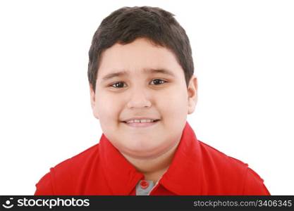Boy looking at the camera with a small smile over white background