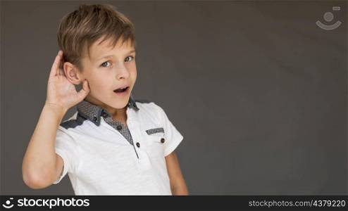 boy looking curious with copy space