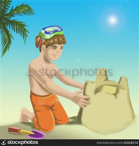 Boy making a sand castle on the beach