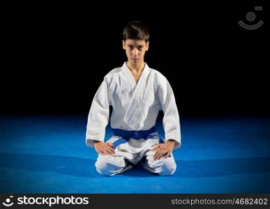 Boy martial arts fighter isolated