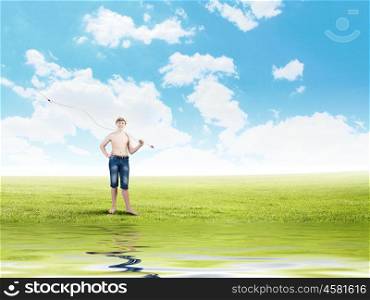 Boy of school age with fishing rod