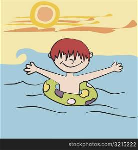 Boy on an inflatable ring in a sea