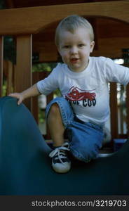 Boy on Play Structure