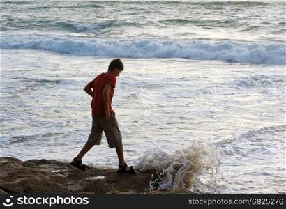 Boy on the shore of the Mediterranean Sea in Israel. Boy on the seashore