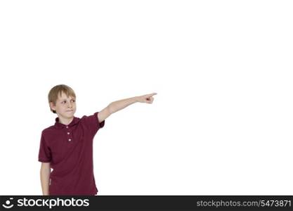 Boy pointing at copy space on white background