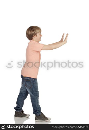 Boy pushing something isolated on white background
