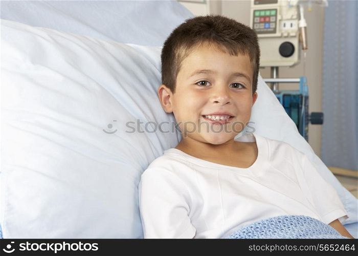 Boy Relaxing In Hospital Bed