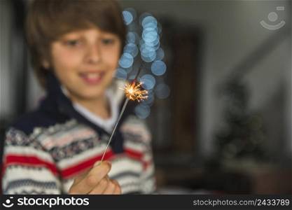 boy showing bengal light