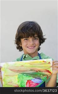 Boy Showing Off Painting