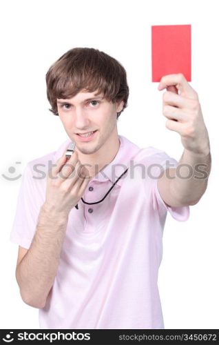 Boy showing red card