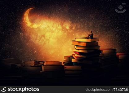 Boy sitting alone on a pile of books, looking a the new moon. Magic night scene. In search of knowlegde concept.