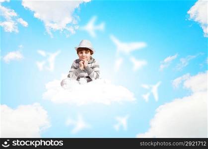 Boy sitting on cloud
