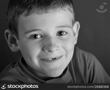 Boy smiling, portrait (B&W)